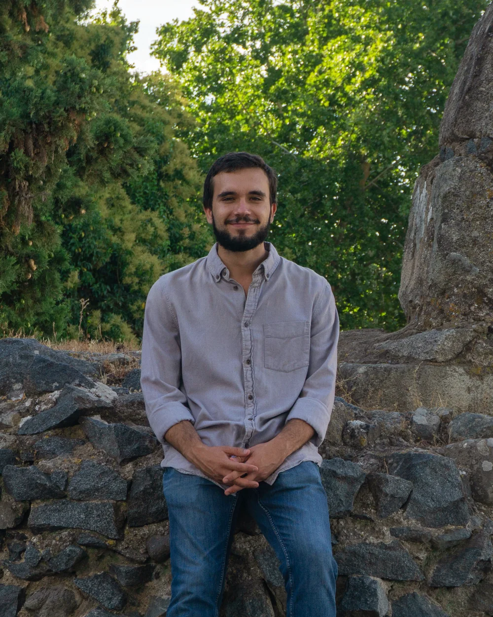 Vasco sitting on Beja’s old stone walls